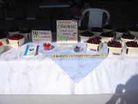vendor tent baskets of cherries